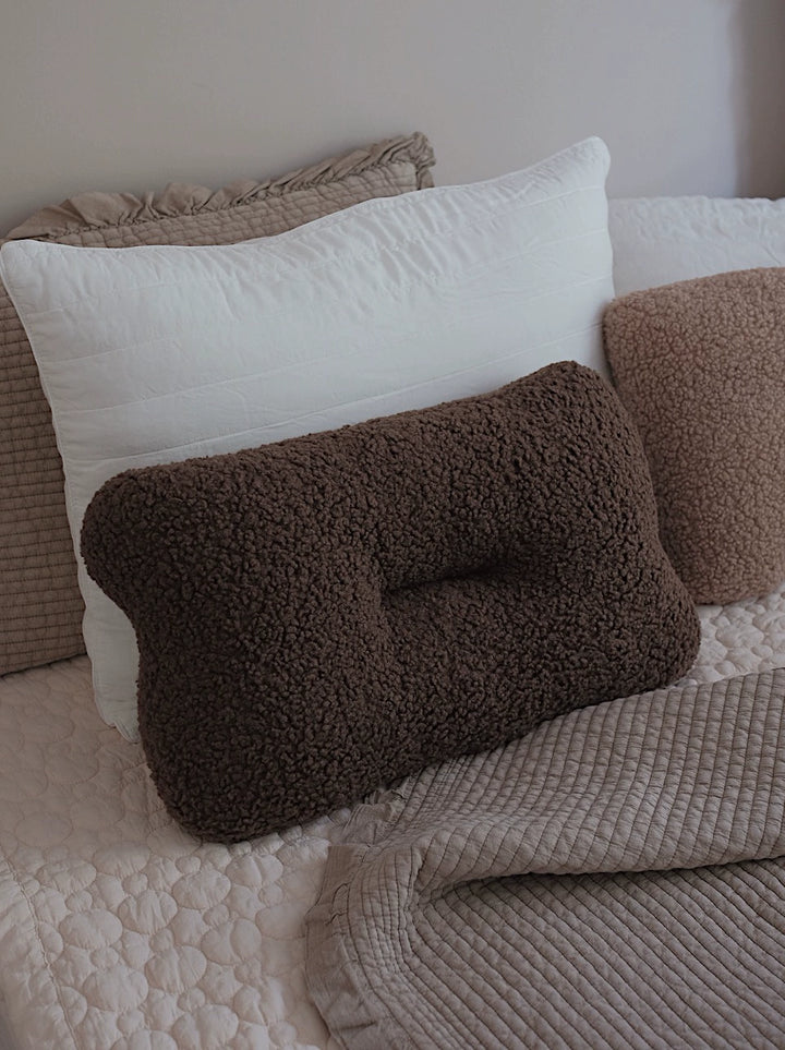 Brown boucle pillow