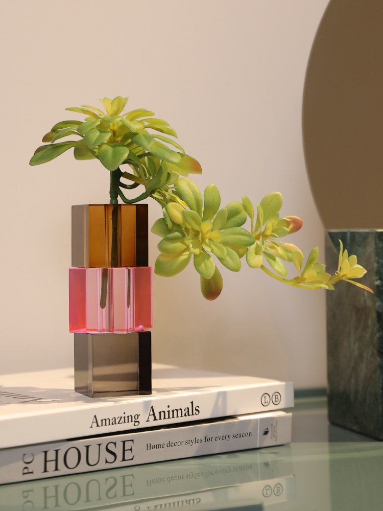 Cosik Home stacked crystal glass vase with amber, pink, and grey sections, holding a green succulent.