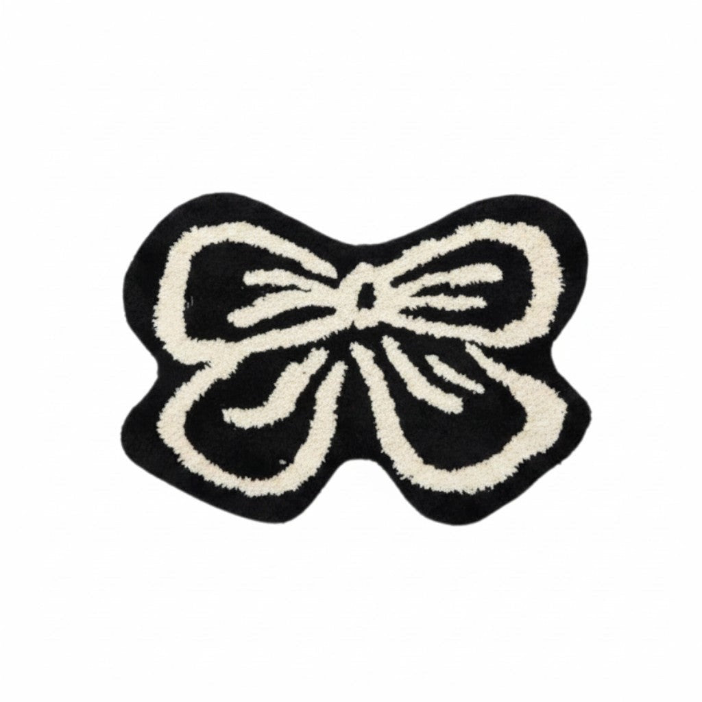 Cosik Home black and cream ribbon bow rug, soft medium pile, playful accent for bedroom or bathroom.