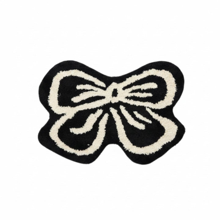Cosik Home black and cream ribbon bow rug, soft medium pile, playful accent for bedroom or bathroom.